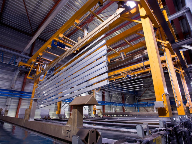 Powder coating plant loading line with PE rollers and seamless belt